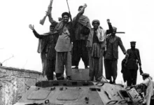 jubilant afghan guerrillas on a captured russian armoured v0 pyaz67a1n40c1 e1777275569901