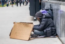 usa chicago illinois may homeless veteran sitting roadside holding cardboard sign asking help downtown man 152489200