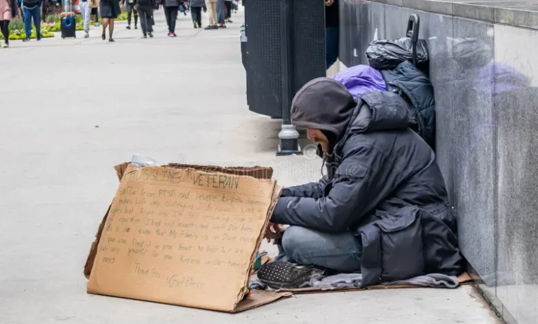 usa chicago illinois may homeless veteran sitting roadside holding cardboard sign asking help downtown man 152489200