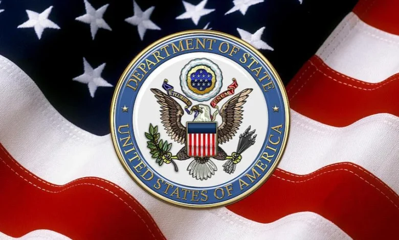 us department of state dos emblem over american flag serge averbukh